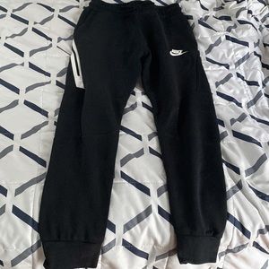 Black/White Nike tech pants